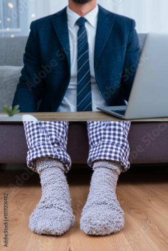 Split view of a remote worker wearing a suit jacket and pajama pants while working from home