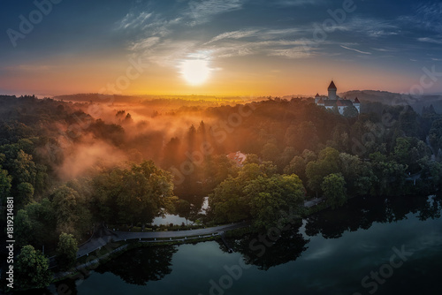 view of Konopiste Castle at sunrise in the fog