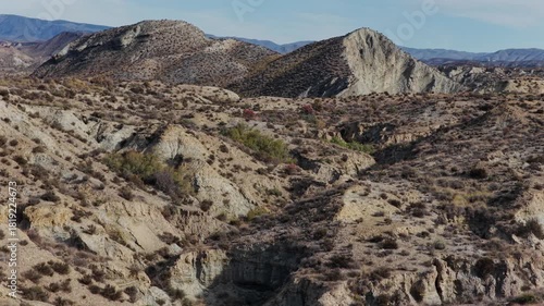 Cinematic Aerial View: The Arid, Dry Terrain of the Tabernas Desert, Andalusia, Illustrating Growing Desertification in Southern Spain