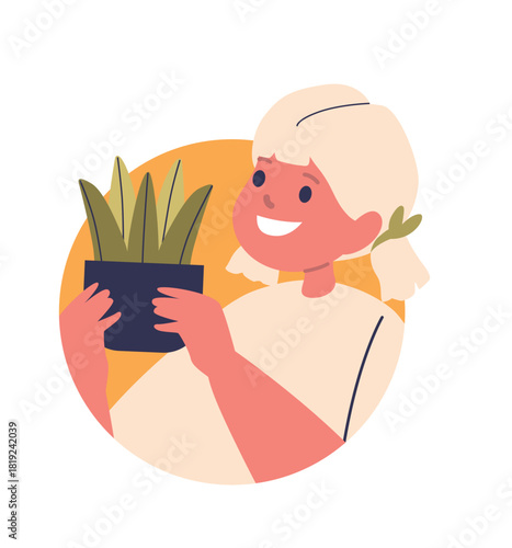 Cute girl holding potted plant