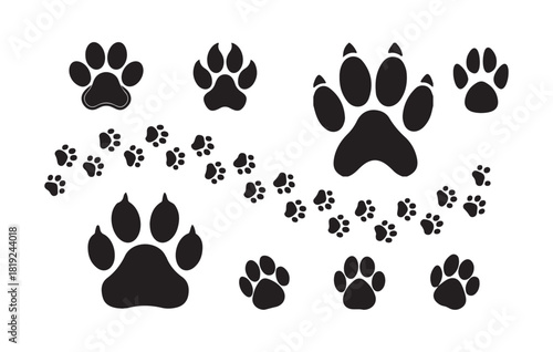 Large set of various black dog paw print icons on white background animal paw vector illustration
