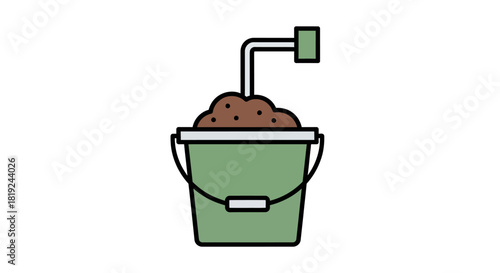 Green bucket filled with soil and a pipe sticking out.