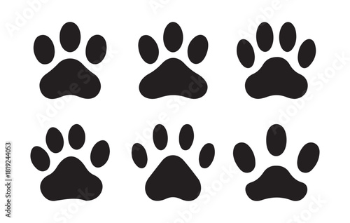 Collection of six black dog paw print icons on white background animal paw vector illustration