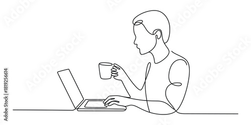 Focused individual working on laptop and enjoying coffee break