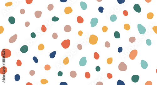 Abstract seamless pattern with scattered colorful organic dots on a white background, creating a modern and cheerful design.
