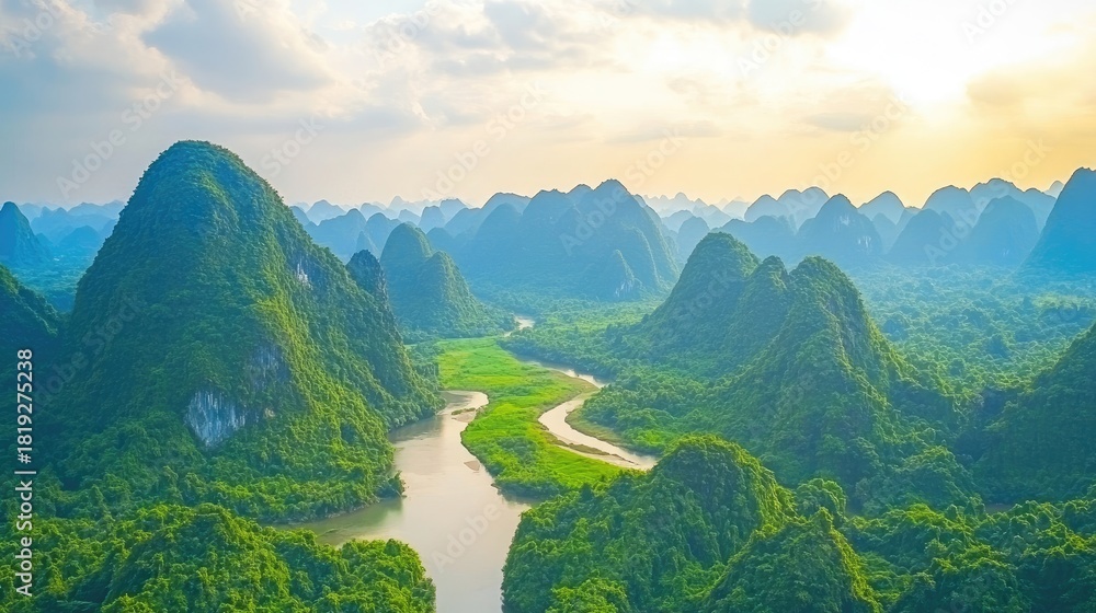 Fototapeta premium Golden Dawn Over a Serpentine River in a Verdant Sea of Endless Karst Mountains.