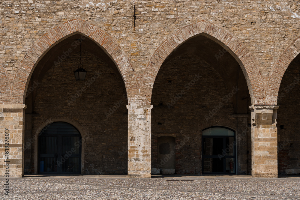 Fototapeta premium Bergamo's historic architecture under a bright blue sky