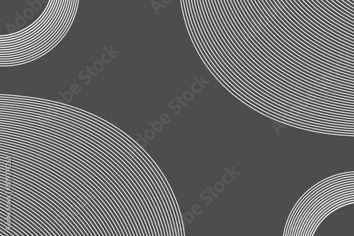 Abstract background with curved white line patterns forming partial circular shapes on a dark grey surface. Minimalist and modern geometric design.
