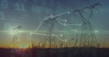 Silhouetting lattice steel towers and power lines over tall grass at sunset, showing data network