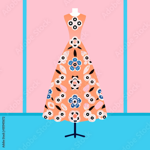 Whimsical floral dress displayed on a mannequin