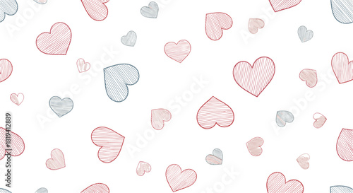 A delightful seamless pattern showcases an assortment of randomly scattered sketched hearts in charming shades of red and blue.