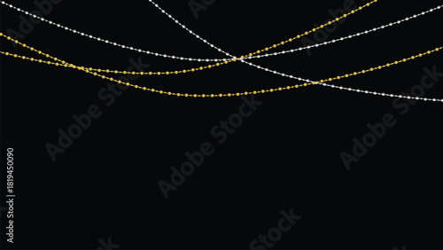 Elegant string of golden and white glitter lights hanging against a black background