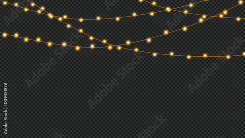 String of warm yellow glowing fairy lights or string lights hanging against a dark background