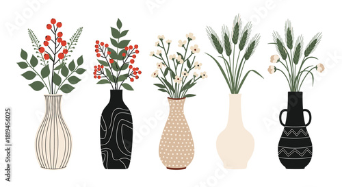 Elegant collection of five different bouquets with flowers berries and wheat arranged in stylish modern ceramic vases.