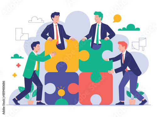 Four business people collaborating to assemble a large puzzle pieces set