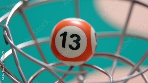 Close up Orange Bingo Ball Number Thirteen