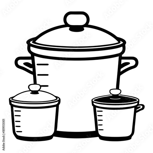 Set of cooking pots with lids and measurement markings