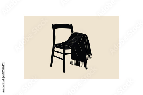 Wool blanket folded on wooden chair black silhouette with fringe and soft line details flat slow lifestyle image