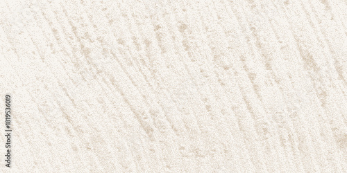Dirty noisy field with dotted grit overlay. Ecru concrete surface with weathered stone feel. Grunge aged background layout.