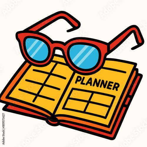 Glasses resting on planner,