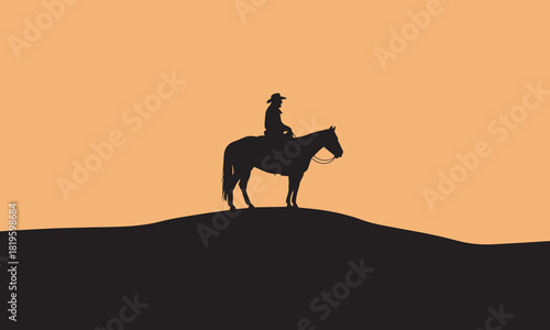 Cowboy on horseback silhouette during sunset on a hill in a simple minimalist desert landscape