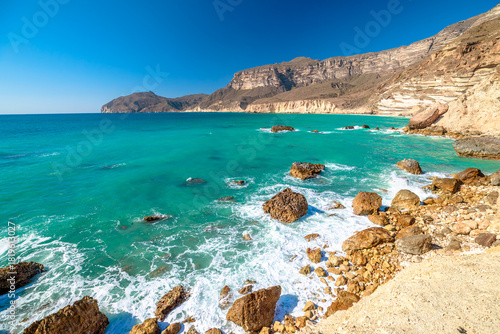 Wallpaper Mural Al Fizayah hidden beach of Salalah in Oman. Local beach with camels grazing along the beach and mountains enhance the natural beauty of this popular destination of South Oman coast. Torontodigital.ca