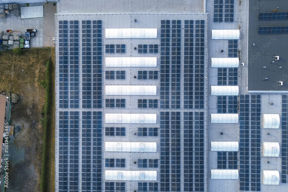 Obraz premium Aerial view of solar panel installation site