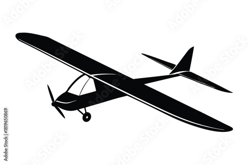 Side view of a black glider plane silhouette against a white background