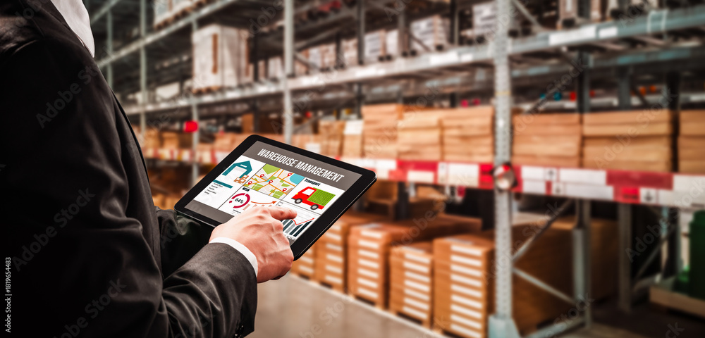 Naklejka premium Warehouse management innovative software in computer for real time monitoring of goods package delivery . Computer screen showing smart inventory dashboard for storage and supply chain distribution .