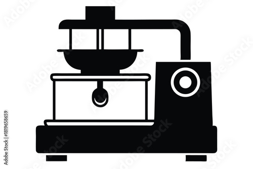 The black food processor features a mixing bowl with a spoon inside