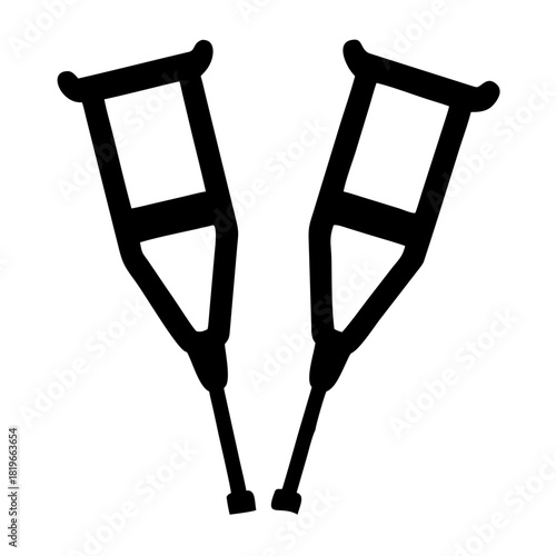 A pair of black crutches, medical walking aids used for support and mobility, standing upright and