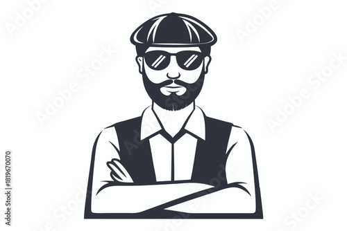 Confident bearded man with sunglasses and flat cap stands with his arms crossed