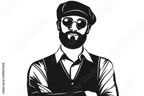 Confident bearded gentleman wearing a cap and glasses stands with folded arms in black and white