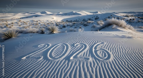 2026 written in pristine ripples of white desert sand dunes
