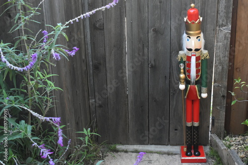 Colorful Christmas Nutcracker Soldier Tall wooden statue in garden yard