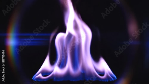 Abstract blue and orange flame dance against a dark background