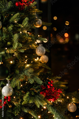 Beautiful Christmas tree decorated with festive ornaments
Festive holiday tree adorned with baubles and lights
Classic evergreen Christmas tree with seasonal decor
