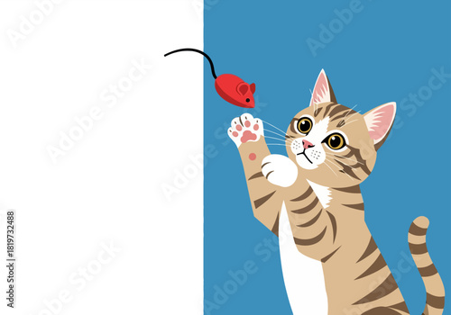 A playful cartoon tabby cat reaches up trying to catch a dangling red mouse toy.