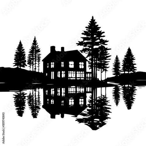 Silhouette of a house reflected in water surrounded by pine trees
