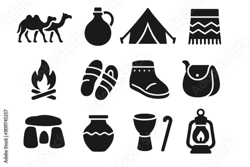 Nomadic Desert Icons. Solid style icons of Nomadic Desert Life: Camel Caravan, Water Skin, Tent, Fire Pit, Sandals, Woven Blanket,