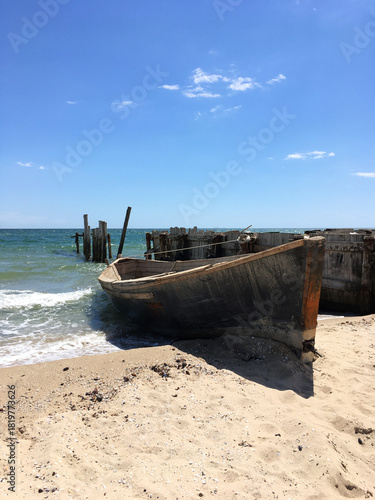 Old fishing boat on the seashore