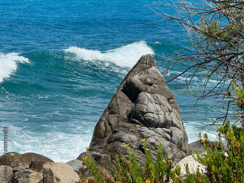 Calabria, Italy, beach and surf among rocks, Mediterranean