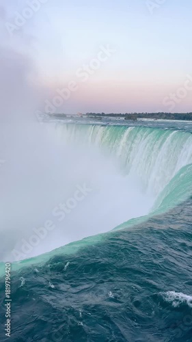 Breathtaking landscape of Niagara Falls waterfalls surrounded by lush nature and river