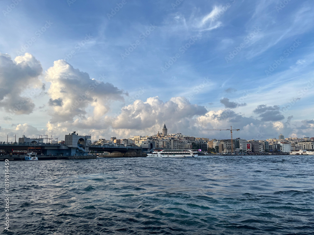 Naklejka premium Karakoy Coastline, Galata Bridge and behind Galata Tower from Eminonu Port in Istanbul, Turkey.