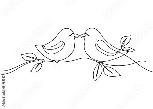 Two birds kissing while perched on a branch with leaves  