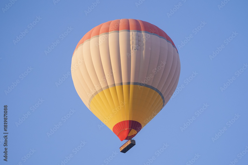 Naklejka premium Hot Air Balloon over Cappadocia Valleys in Nevsehir, Turkiye