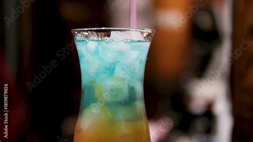 Blue Hawaiian Cocktail drink Perfect for beach parties or island getaways,nrefreshing and exotic libation that embodies the spirit of the tropics. High quality 4k footage