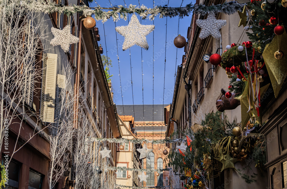 Obraz premium Festive decorations on half timbered houses, Strasbourg Christmas Market, France