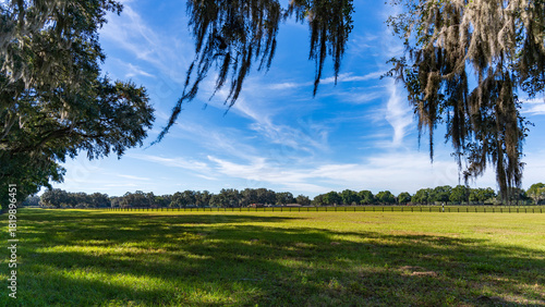 Beautiful Ocala horse ranch on a blue sky