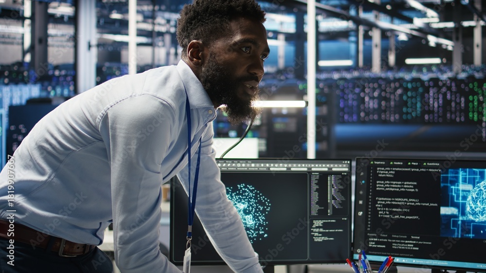Fototapeta premium Server farm supervisor and man with disability adjust system settings based on AI analytics. Data center manager talking with technician in wheelchair overseeing automated node tree tool, camera A